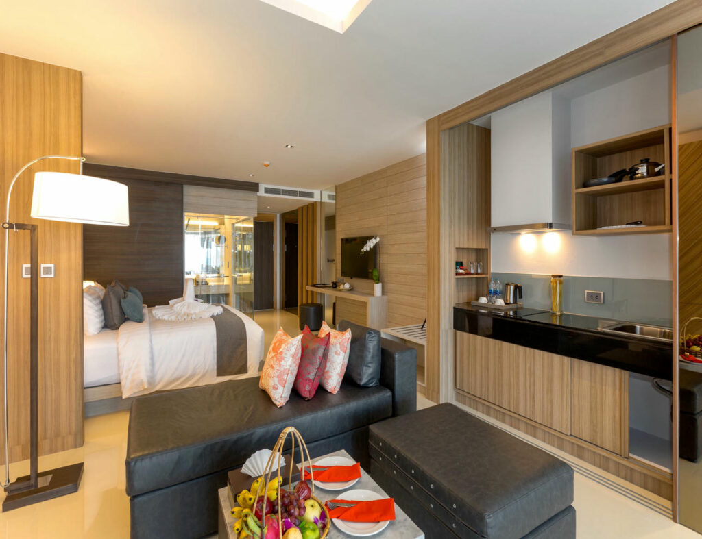 Wide view of the Deluxe Twin Room showcasing its airy layout and cozy atmosphere