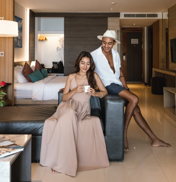 Modern and cozy room interior at Kudo Hotel with stylish décor and comfortable amenities near Patong Beach