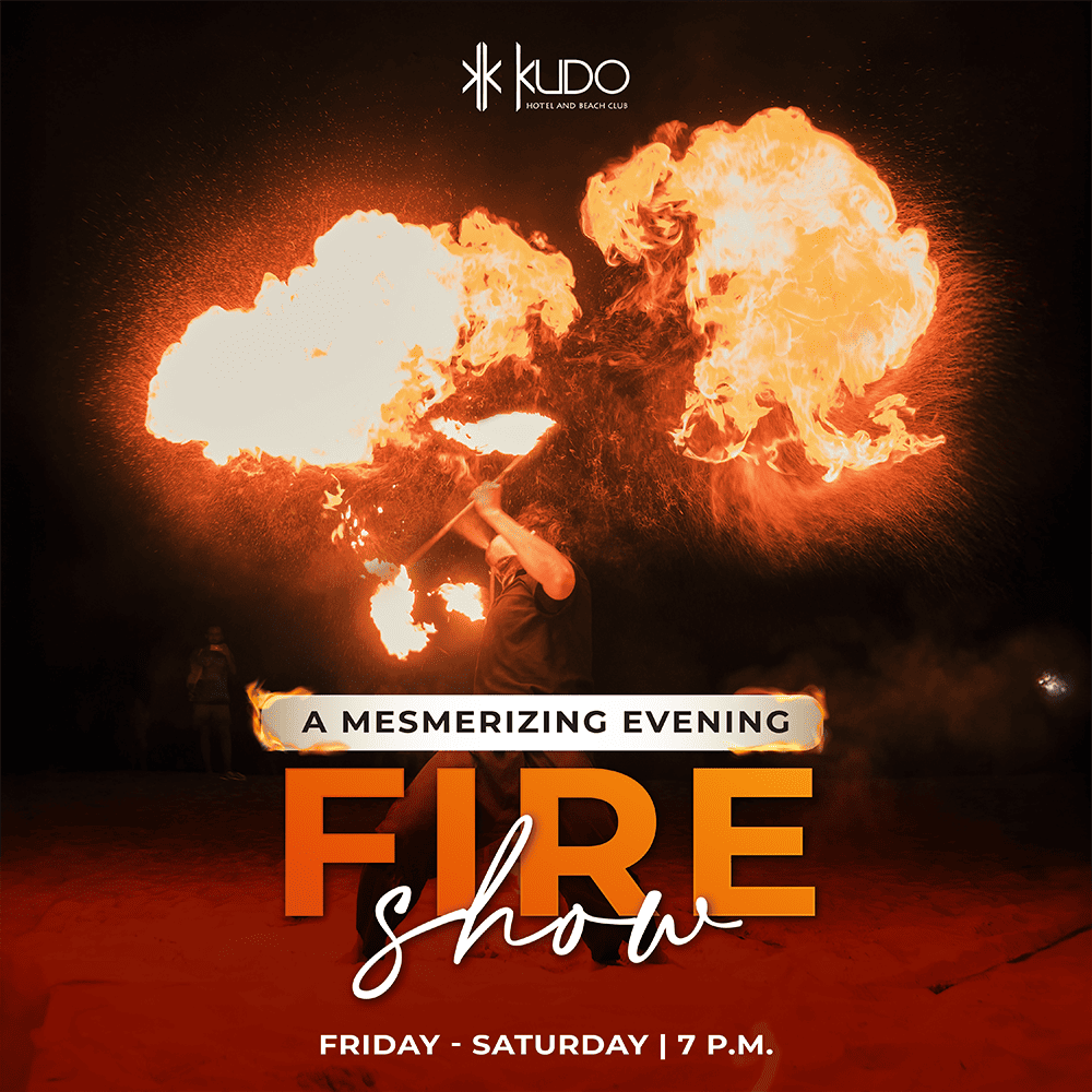 Dazzling fire show performance at Kudo Hotel and Beach Club illuminating the night sky